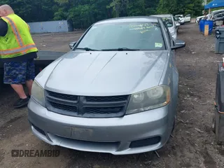 2014 Dodge Avenger SE with VIN 1C3CDZAB5EN149248, listed as a IAAI auction lot 42524423 with 120,974 mi miles and . Bid and sale history available at DreamBid. Image 6.