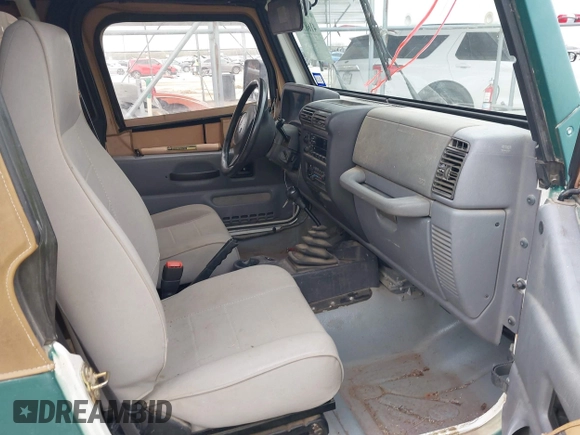 1997 Jeep Wrangler SE with VIN 1J4FY29P1VP408966, listed as a IAAI auction lot 41683640 with 106,910 mi miles. Bid and sale history available at carsss.com. Image 5.