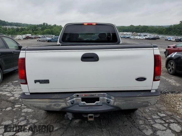 2003 Ford F-150 XL with VIN 1FTRX18L33NA43522, listed as a Copart auction lot 61197615 with 101,061 mi miles and Salvage title. Bid and sale history available at DreamBid. Image 6.
