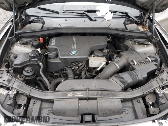 2014 BMW X1 xDrive28i with VIN WBAVL1C52EVY15236, listed as a Copart auction lot 50140885 with 141,088 mi miles and Salvage Title. Bid and sale history available at carsss.com. Image 14.
