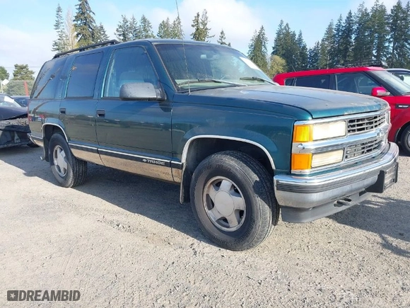 1998 Chevrolet Tahoe with VIN 1GNEK13R9WJ365044, listed as a IAAI auction lot 42042506 with 187,987 mi miles. Bid and sale history available at carsss.com. Image 1.