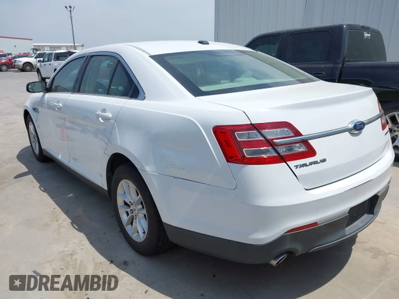 2015 Ford Taurus SE with VIN 1FAHP2D8XFG105029, listed as a IAAI auction lot 42068632 with 164,098 mi miles and . Bid and sale history available at carsss.com. Image 6.