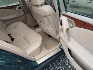 1998 Mercedes-Benz E-Class with VIN WDBJF65FXWA589630, listed as a IAAI auction lot 41990725 with 102,149 mi miles. Bid and sale history available at carsss.com. Image 8.