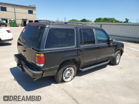 1997 Ford Explorer XLT with VIN 1FMDU35P5VZB51640, listed as a Copart auction lot 52030474 with 214,647 mi miles and Clean title. Bid and sale history available at DreamBid. Image 3.
