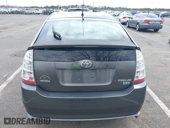 2007 Toyota Prius z VIN JTDKB20U073266399, wystawiony jako IAAI lot #41947176 z przebiegiem 186 258 mil mil oraz . Historia ofert i sprzedaży dostępna na DreamBid. Obrazek 16.