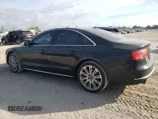 2013 Audi A8 3.0L with VIN WAUAGAFDXDN032766, listed as a Copart auction lot 84275944 with 127,388 mi miles and Salvage title. Bid and sale history available at DreamBid. Image 2.