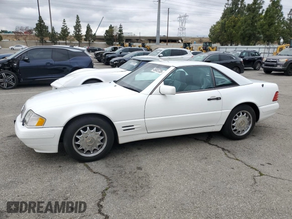 1997 Mercedes-Benz SL 500 with VIN WDBFA63F5VF143197, listed as a Copart auction lot 45003735 with 100,252 mi miles and Salvage title. Bid and sale history available at DreamBid. Image 1.