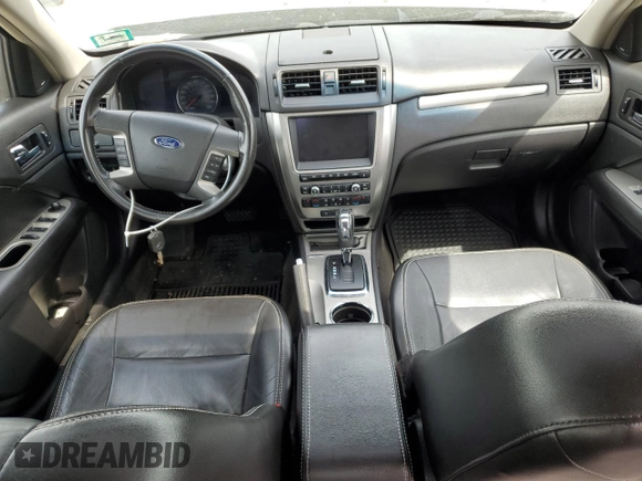 2010 Ford Fusion Hybrid с VIN 3FADP0L34AR129353, выставлен на аукционе Copart как лот 58310725 с пробегом 237 662 миль миль и Списание • Salvage title. История ставок и продаж доступна на DreamBid. Изображение 8.