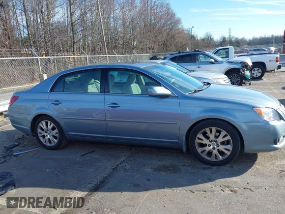2009 Toyota Avalon XL with VIN 4T1BK36B19U350297, listed as a IAAI auction lot 41589714 with 141,003 mi miles. Bid and sale history available at carsss.com. Image 13.