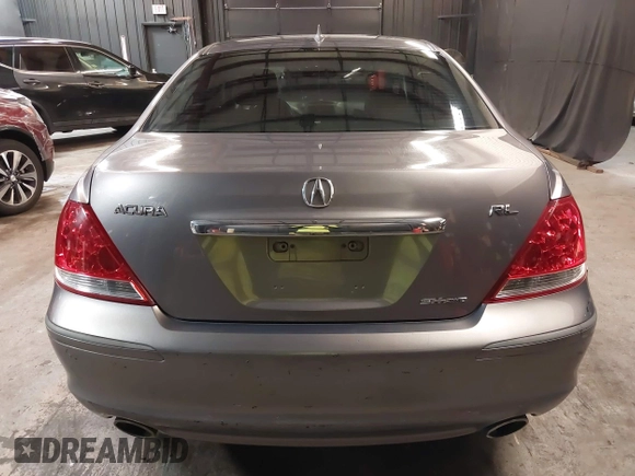 2006 Acura RL z VIN JH4KB165X6C009547, wystawiony jako IAAI lot #42073784 z przebiegiem 190 601 mil mil oraz . Historia ofert i sprzedaży dostępna na DreamBid. Obrazek 17.