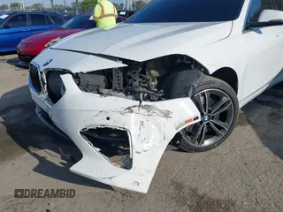 2021 BMW 2 Series 228i with VIN WBA53AK09M7H30650, listed as a IAAI auction lot 42043390 with 89,611 mi miles and . Bid and sale history available at DreamBid. Image 6.