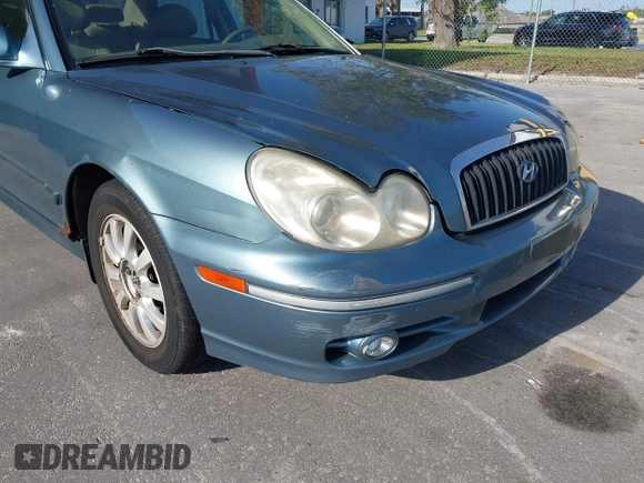 2004 Hyundai Sonata GLS with VIN KMHWF35H84A049046, listed as a IAAI auction lot 42071777 with 158,148 mi miles. Bid and sale history available at carsss.com. Image 12.
