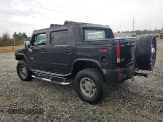 2005 Hummer H2 SUT with VIN 5GRGN22U95H114257, listed as a Copart auction lot 84246794 with 191,872 mi miles and Clean Title. Bid and sale history available at carsss.com. Image 2.