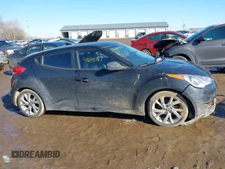2016 Hyundai Veloster z VIN KMHTC6AD1GU262391, wystawiony jako IAAI lot #41649087 z przebiegiem 96 104 mil mil oraz . Historia ofert i sprzedaży dostępna na DreamBid. Obrazek 13.