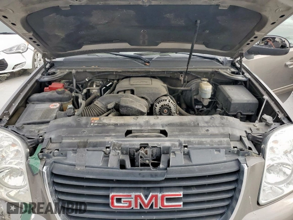 2011 GMC Yukon SLT z VIN 1GKS1CE01BR359134, wystawiony jako Copart lot #53693295 z przebiegiem 95 060 mil mil oraz Szkoda całkowita • Salvage title. Historia ofert i sprzedaży dostępna na DreamBid. Obrazek 12.
