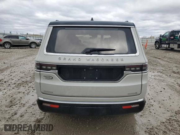 2022 Jeep Grand Wagoneer Series III с VIN 1C4SJVGJ8NS184925, выставлен на аукционе Copart как лот 51525905 с пробегом 77 019 миль миль и Списание • Salvage title. История ставок и продаж доступна на DreamBid. Изображение 6.