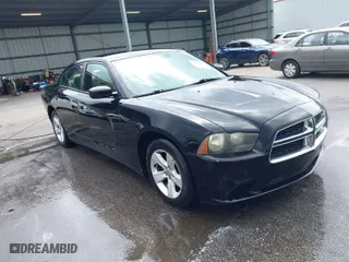 2013 Dodge Charger SE with VIN 2C3CDXBG6DH526840, listed as a IAAI auction lot 41929002 with 273,890 mi miles. Bid and sale history available at carsss.com. Image 1.