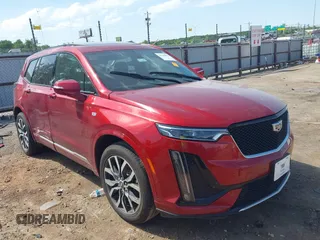 2021 Cadillac XT6 Sport with VIN 1GYKPGRS9MZ136205, listed as a IAAI auction lot 39385075 with 48,886 mi miles and . Bid and sale history available at DreamBid. Image 1.