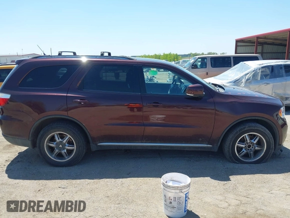 2012 Dodge Durango Crew with VIN 1C4RDJDG0CC337408, listed as a IAAI auction lot 42193647 with 186,352 mi miles and . Bid and sale history available at carsss.com. Image 14.