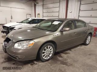 2010 Buick Lucerne CXL with VIN 1G4HC5EM4AU122627, listed as a IAAI auction lot 41836235 with 134,337 mi miles. Bid and sale history available at carsss.com. Image 2.