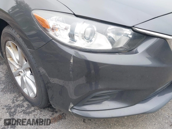 2014 Mazda 6 i Sport with VIN JM1GJ1U52E1102800, listed as a IAAI auction lot 42266283 with 103,886 mi miles and . Bid and sale history available at DreamBid. Image 13.