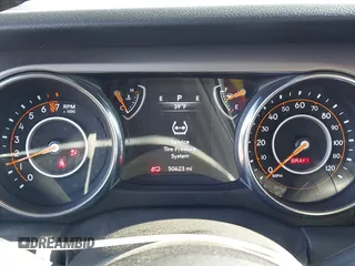2020 Jeep Wrangler Unlimited Sport S z VIN 1C4HJXDG2LW335973, wystawiony jako IAAI lot #41376136 z przebiegiem 50 623 mil mil oraz . Historia ofert i sprzedaży dostępna na DreamBid. Obrazek 7.