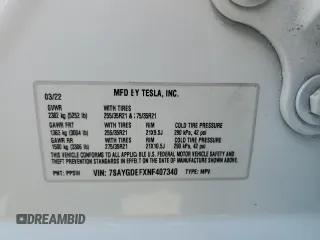 2022 Tesla Model Y Performance with VIN 7SAYGDEFXNF407340, listed as a Copart auction lot 54376895 with 56,709 mi miles and Salvage Title. Bid and sale history available at DreamBid. Image 12.