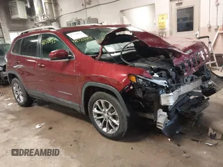 2019 Jeep Cherokee Latitude Plus with VIN 1C4PJLLB4KD359065, listed as a IAAI auction lot 41738445 with 56,650 mi miles. Bid and sale history available at carsss.com. Image 1.
