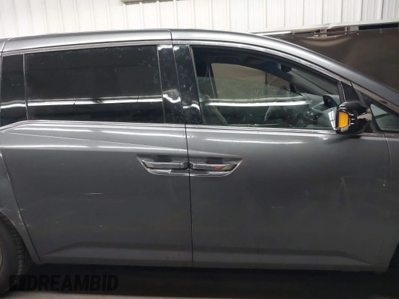 2012 Honda Odyssey Touring с VIN 5FNRL5H99CB047340, выставлен на аукционе IAAI как лот 41965189 с пробегом Не указан миль и . История ставок и продаж доступна на DreamBid. Изображение 13.