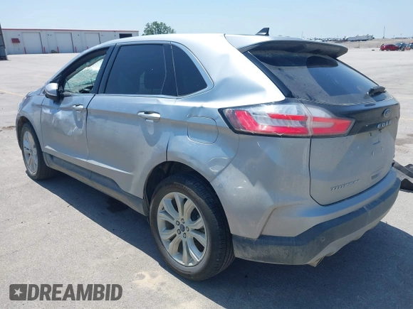 2022 Ford Edge Titanium with VIN 2FMPK4K96NBA41746, listed as a IAAI auction lot 42551594 with 86,730 mi miles and . Bid and sale history available at DreamBid. Image 3.