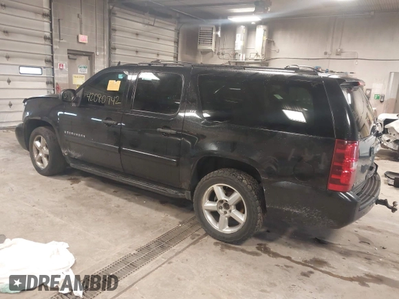 2008 Chevrolet Suburban LT w/3LT with VIN 1GNFK16388J153783, listed as a IAAI auction lot 42080742 with 301,158 mi miles. Bid and sale history available at carsss.com. Image 3.