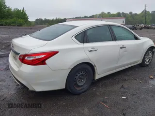 2016 Nissan Altima S with VIN 1N4AL3AP8GC211857, listed as a IAAI auction lot 41977716 with 234,952 mi miles and . Bid and sale history available at DreamBid. Image 4.
