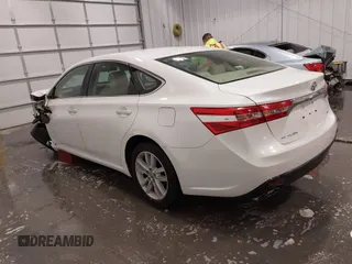 2014 Toyota Avalon Limited with VIN 4T1BK1EB1EU088538, listed as a IAAI auction lot 41793990 with 75,244 mi miles. Bid and sale history available at carsss.com. Image 3.