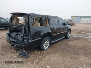 2014 GMC Yukon XL Denali with VIN 1GKS2MEF8ER239777, listed as a IAAI auction lot 41192009 with 142,656 mi miles. Bid and sale history available at carsss.com. Image 4.