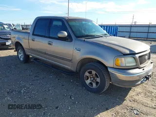 2003 Ford F-150 XLT with VIN 1FTRW07623KC51255, listed as a IAAI auction lot 42678999 with 150,834 mi miles and . Bid and sale history available at DreamBid. Image 1.