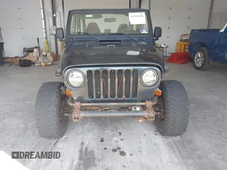 1999 Jeep Wrangler Sport with VIN 1J4FY19S4XP494405, listed as a IAAI auction lot 42542416 with 168,856 mi miles and . Bid and sale history available at DreamBid. Image 6.