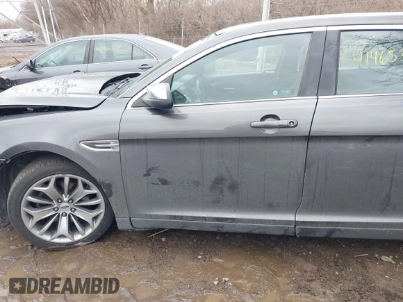 2015 Ford Taurus Limited with VIN 1FAHP2J88FG153326, listed as a IAAI auction lot 41465344 with 98,727 mi miles. Bid and sale history available at carsss.com. Image 14.