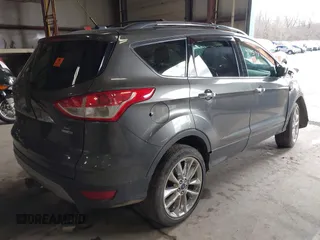 2016 Ford Escape SE with VIN 1FMCU9G93GUA33373, listed as a IAAI auction lot 41739890 with Not Provided miles and . Bid and sale history available at DreamBid. Image 4.