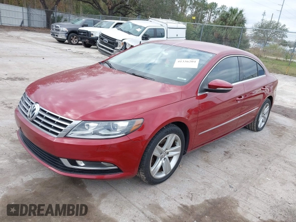 2014 Volkswagen CC Sport with VIN WVWBN7AN0EE527558, listed as a IAAI auction lot 41336204 with 130,005 mi miles and . Bid and sale history available at DreamBid. Image 2.