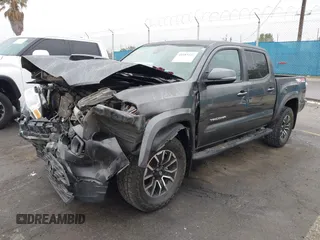 2020 Toyota Tacoma SR5 z VIN 3TMCZ5AN6LM323920, wystawiony jako IAAI lot #41885427 z przebiegiem 153 952 mil mil oraz . Historia ofert i sprzedaży dostępna na DreamBid. Obrazek 17.