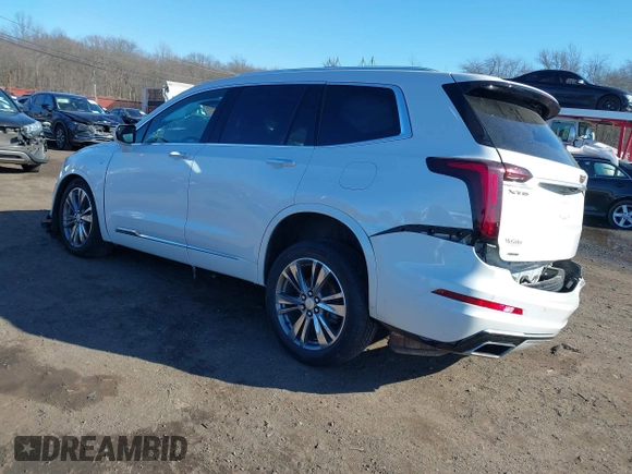 2021 Cadillac XT6 Premium Luxury with VIN 1GYKPDRS9MZ236075, listed as a IAAI auction lot 41632689 with 47,444 mi miles and . Bid and sale history available at DreamBid. Image 3.