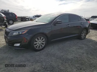 2015 Kia Optima EX with VIN 5XXGN4A74FG414635, listed as a Copart auction lot 48290165 with 147,577 mi miles and Salvage Title. Bid and sale history available at carsss.com. Image 1.