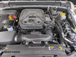 2023 Jeep Wrangler Sport S with VIN 1C4HJXDN5PW678653, listed as a Copart auction lot 57464705 with 22,154 mi miles and Salvage title. Bid and sale history available at DreamBid. Image 11.