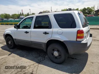 2004 Ford Escape XLS with VIN 1FMCU92114DA15564, listed as a Copart auction lot 59358015 with 186,135 mi miles and Salvage title. Bid and sale history available at DreamBid. Image 2.