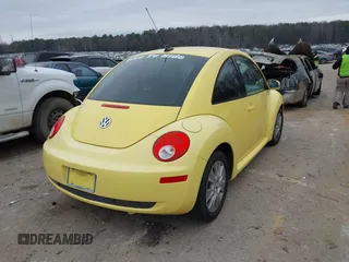 2009 Volkswagen New Beetle Coupe S with VIN 3VWPW31C59M518880, listed as a IAAI auction lot 41201971 with 99,976 mi miles. Bid and sale history available at carsss.com. Image 4.