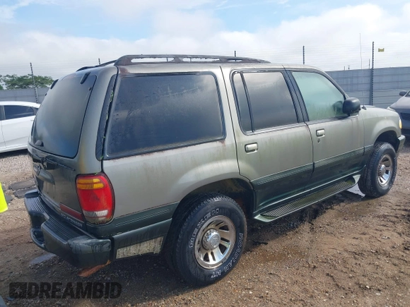 1999 Mercury Mountaineer with VIN 4M2ZU52E1XUJ26317, listed as a IAAI auction lot 42606083 with 126,554 mi miles and . Bid and sale history available at DreamBid. Image 4.