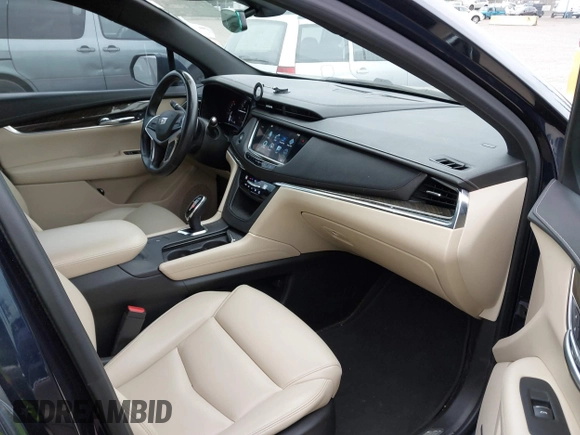 2017 Cadillac XT5 FWD with VIN 1GYKNARS2HZ188557, listed as a IAAI auction lot 41840764 with 104,524 mi miles. Bid and sale history available at carsss.com. Image 5.
