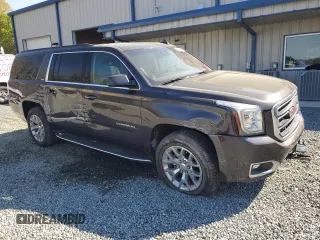 2017 GMC Yukon XL SLT z VIN 1GKS1GKC0HR329962, wystawiony jako Copart lot #51134115 z przebiegiem 69 556 mil mil oraz Szkoda całkowita • Salvage title. Historia ofert i sprzedaży dostępna na DreamBid. Obrazek 4.