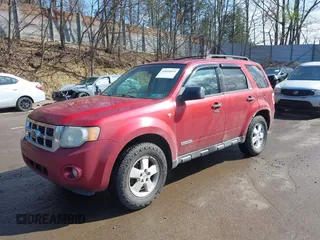 2008 Ford Escape XLT with VIN 1FMCU93108KC15674, listed as a IAAI auction lot 42049019 with 180,077 mi miles. Bid and sale history available at carsss.com. Image 2.
