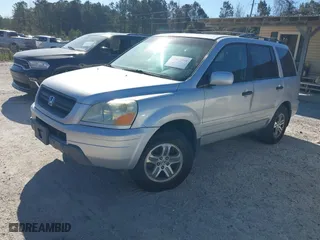 2005 Honda Pilot EX-L with VIN 5FNYF185X5B007358, listed as a IAAI auction lot 41857804 with 291,134 mi miles. Bid and sale history available at carsss.com. Image 2.